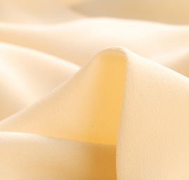 Hedvábný krepdešín pískové barvy